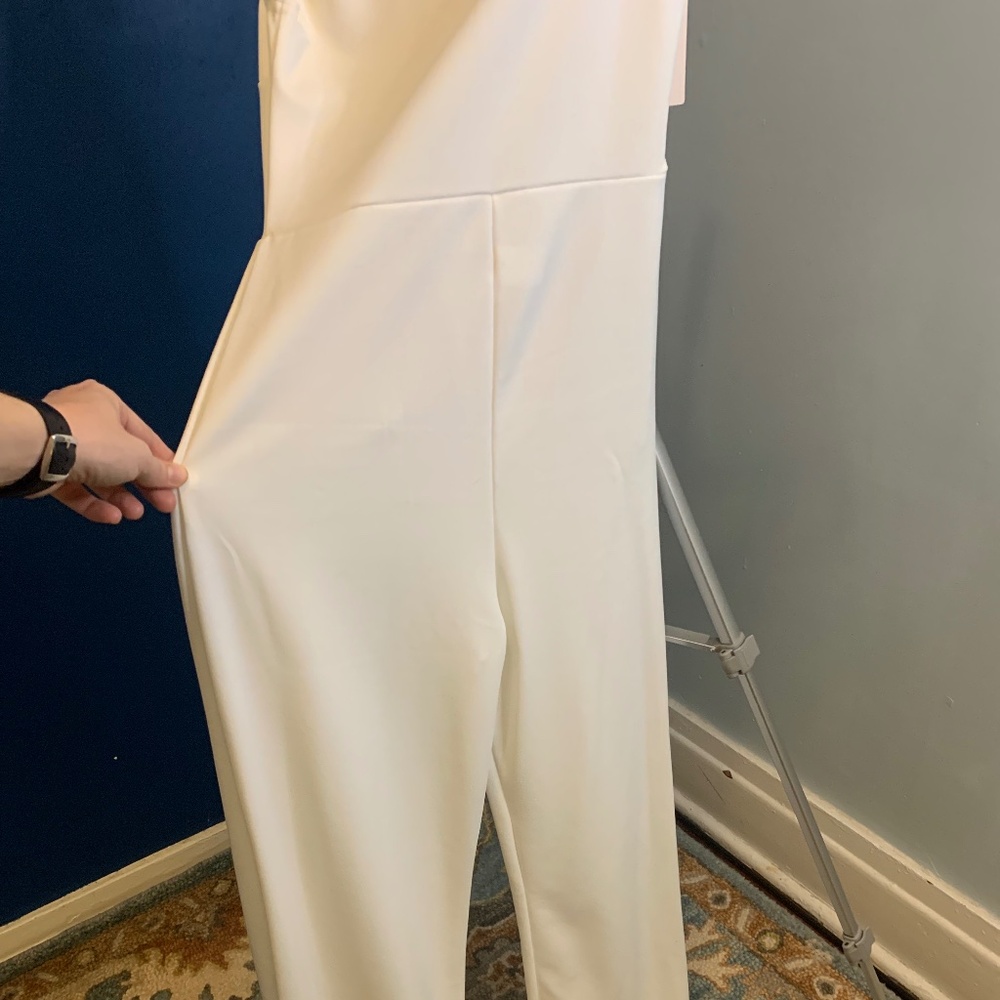 Club London one shoulder white jumpsuit with cape sleeve